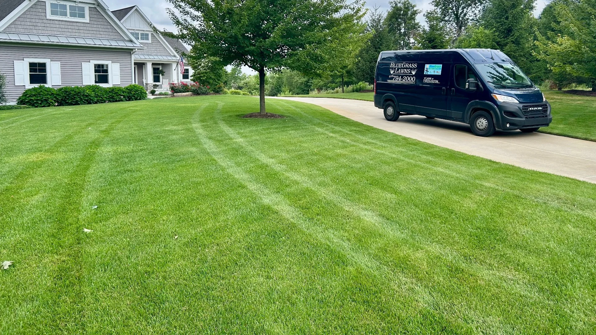 Home in Grand Rapids, MI with green grass that's weed-free.