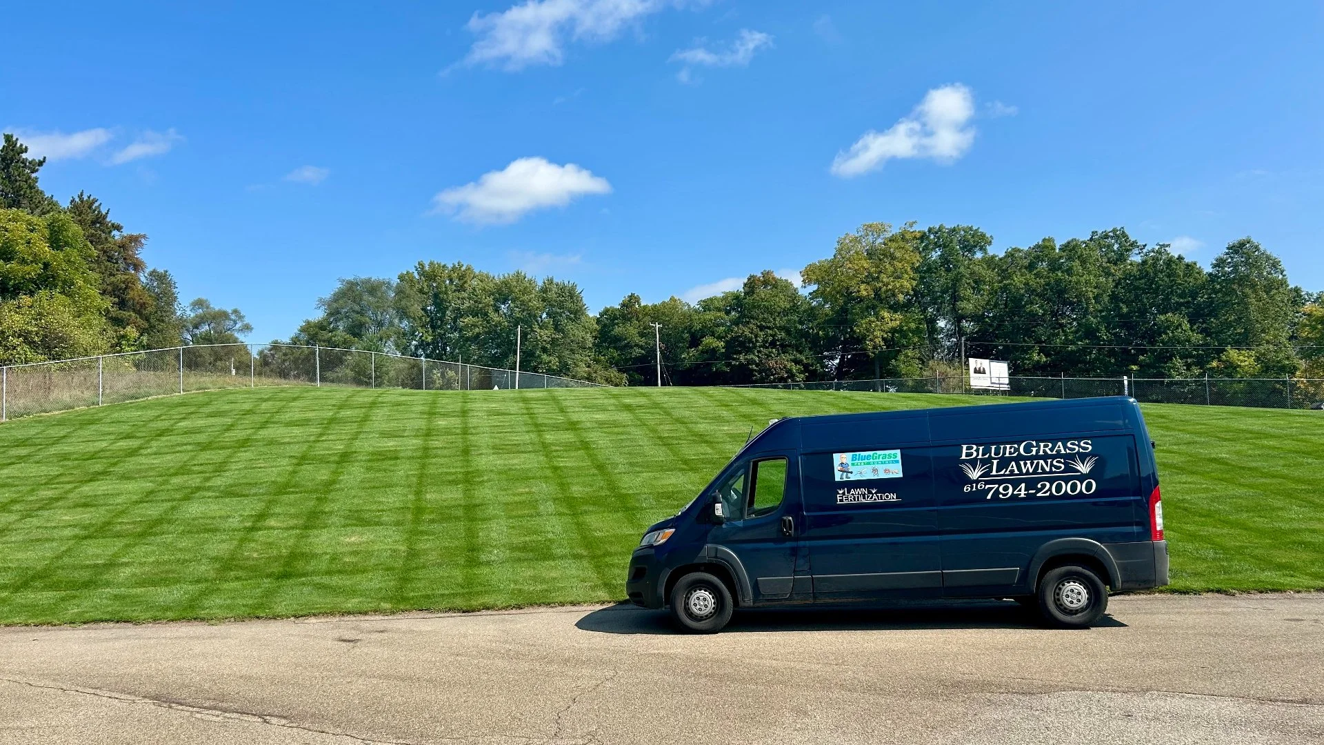 Home in Grand Rapids, MI with green grass that's weed-free.