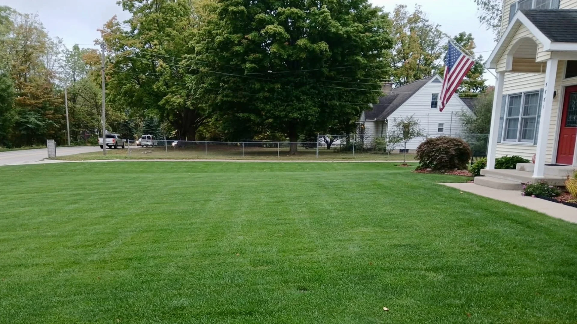 Home in Grand Rapids, MI with green grass that's weed-free.