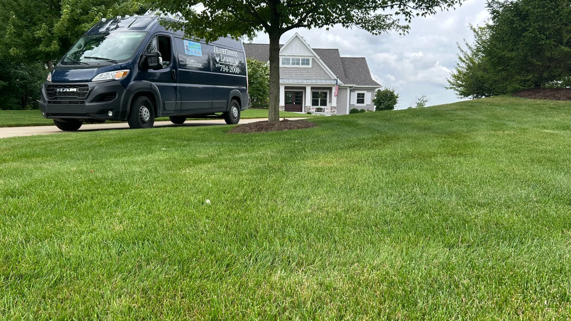 Home in Grand Rapids, MI with green grass that's weed-free.