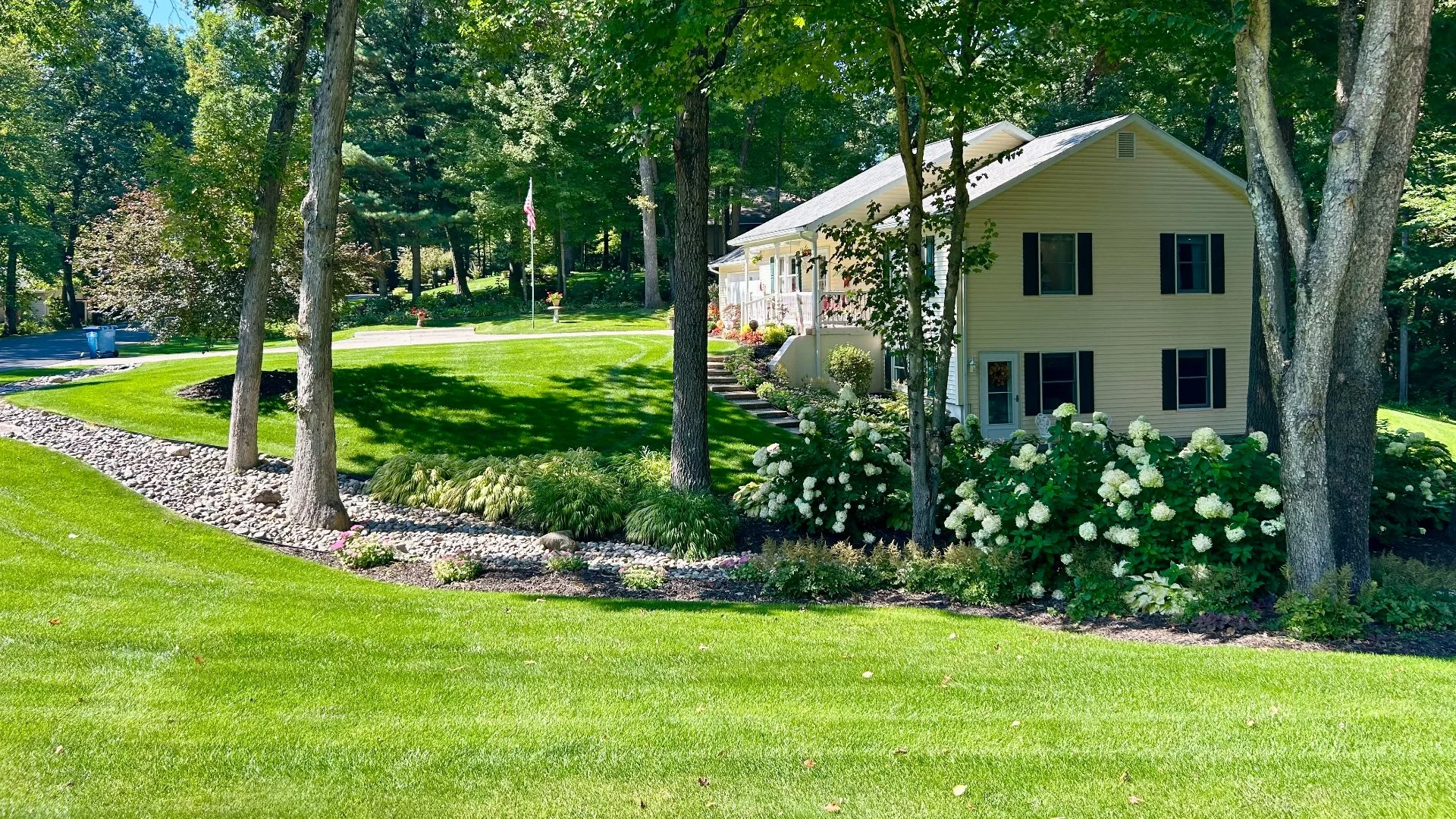 Home in Grand Rapids, MI with green grass that's weed-free.