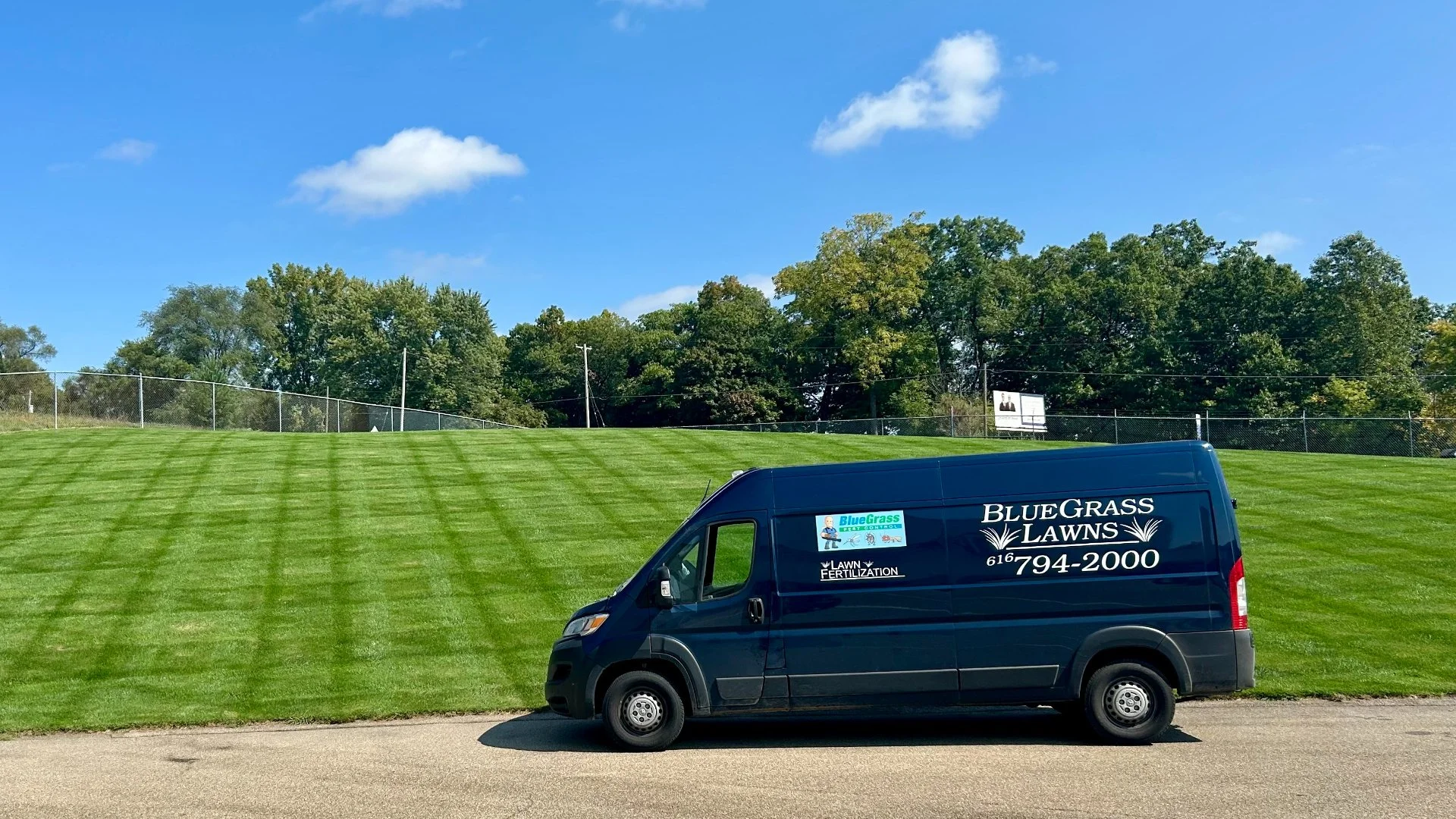 Home in Grand Rapids, MI with green grass that's weed-free.