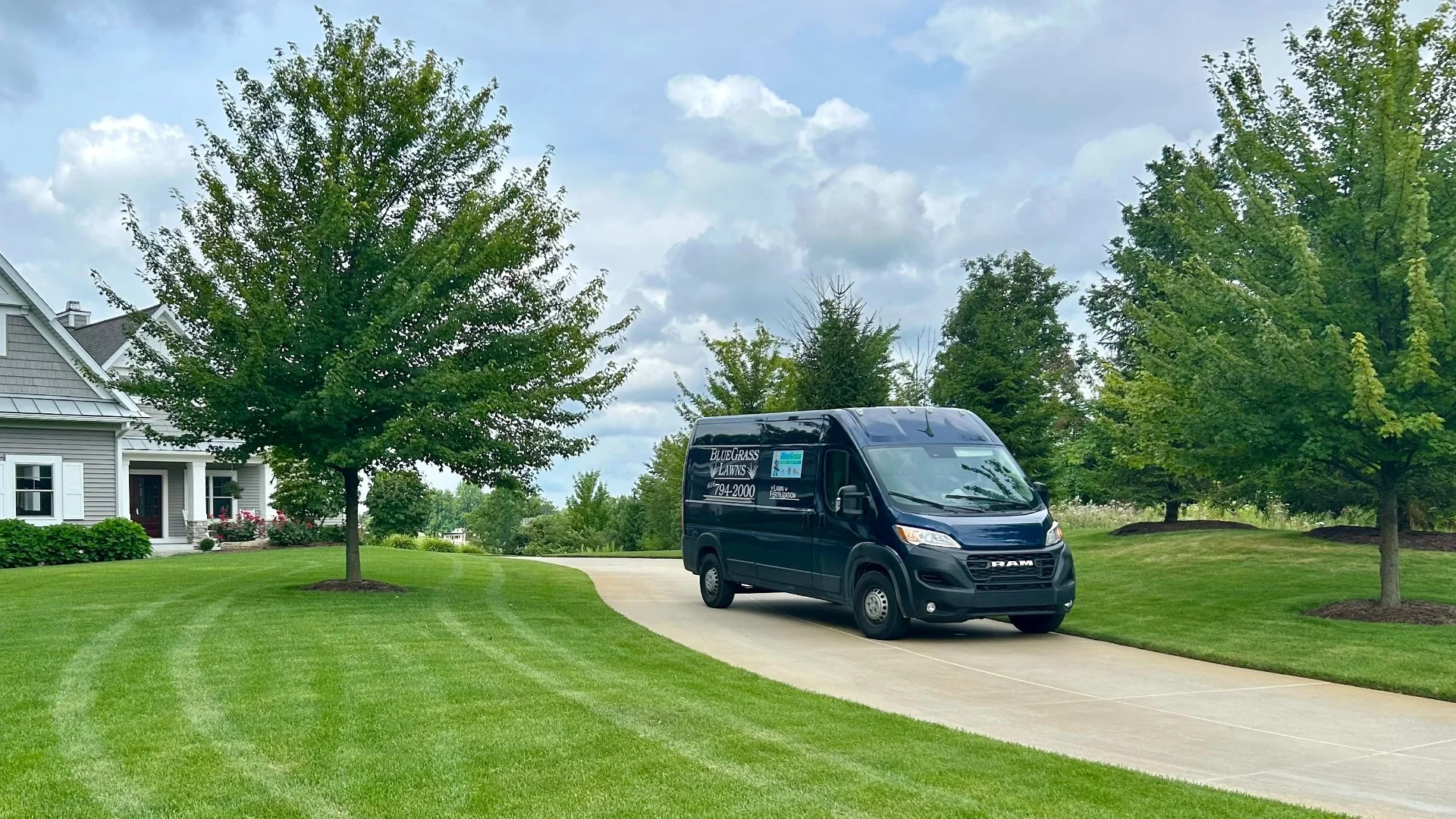 Home in Grand Rapids, MI with green grass that's weed-free.