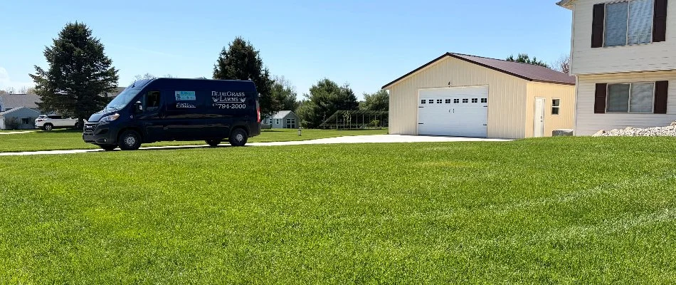 House and truck near a lawn in Grand Rapids, MI.