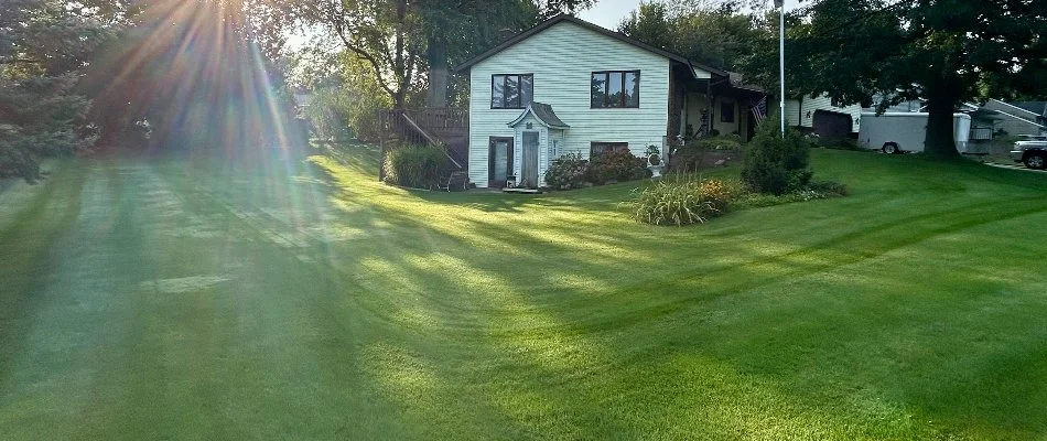 House and wide green lawn in Muskegon, MI.